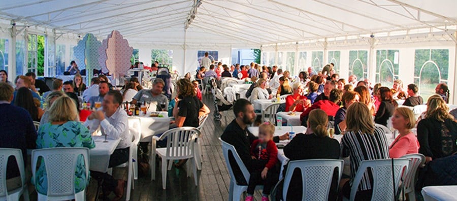Employees and family come together