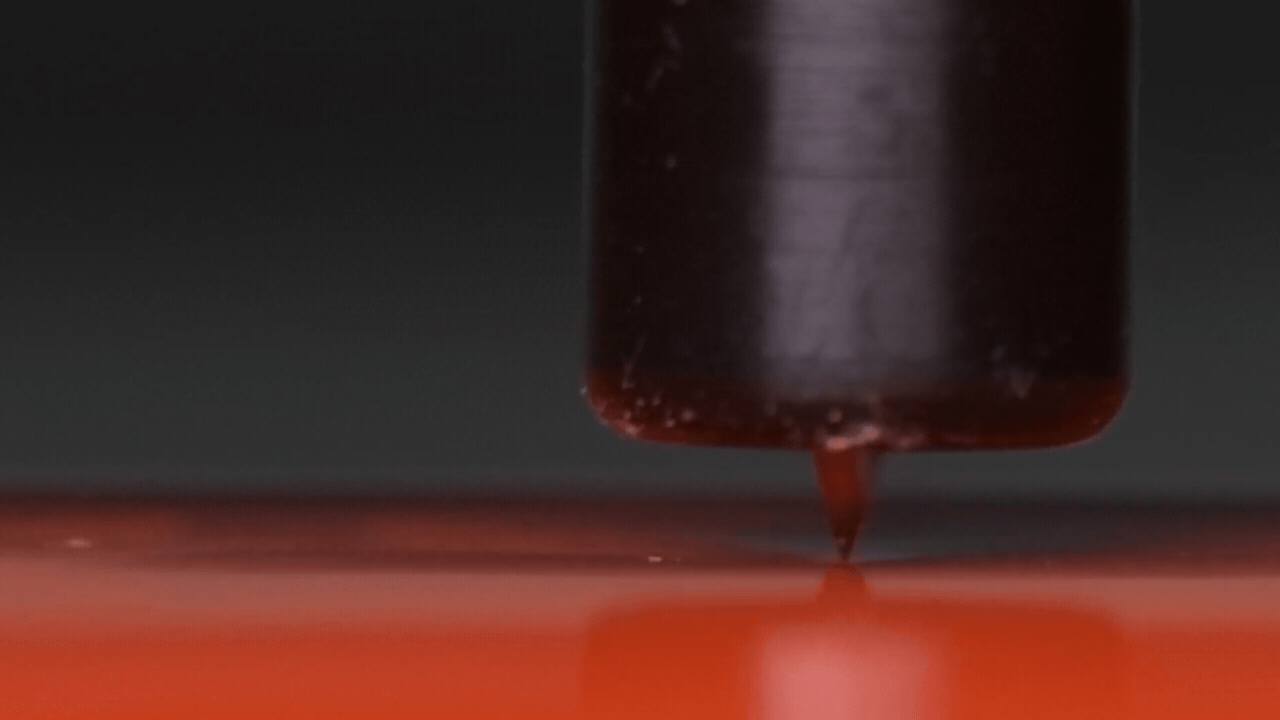 A drag knife smoothly cuts through vinyl in a continuous motion, without lifting or leaving the material.