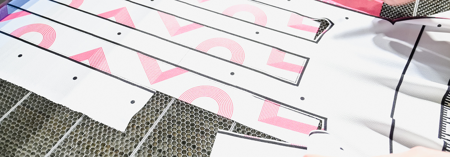A black outline surrounds the textile prints, marking the path the Trace & Cut tool will follow to cut the material. This process eliminates the need for a separate print file, saving time and simplifying the workflow.